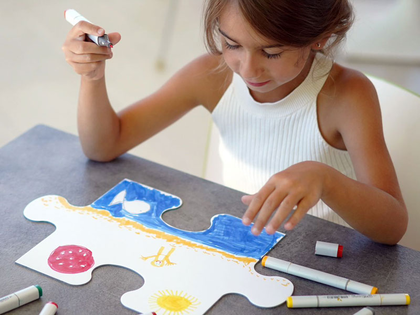 Ravensburger Puzzle-Aktion: Kinder gestalten Riesenpuzzle in den Höfen am Brühl in Leipzig